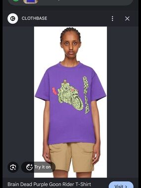 Brain Dead Purple Tee with Neon Green & Pink Goon Rider Graphic